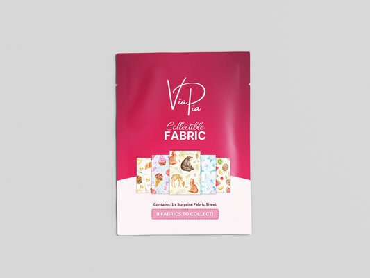 Front of Via Pia blind-box fabric pouch showing collectible packaging for cotton fat quarter fabrics.